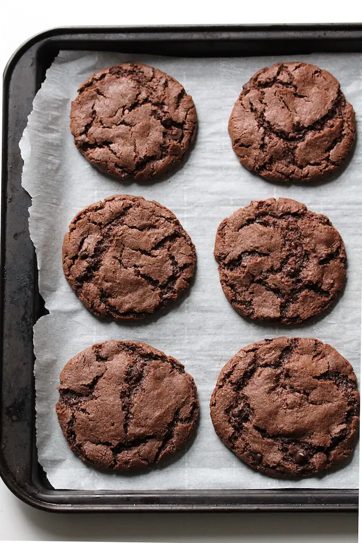 image of Chewy Chocolate Raspberry Cookies on a baking sheet