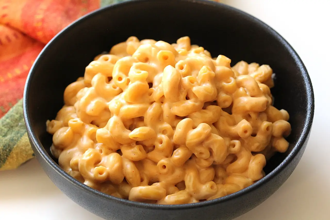 image of Easy Stovetop Vegan Mac and Cheese in a black bowl