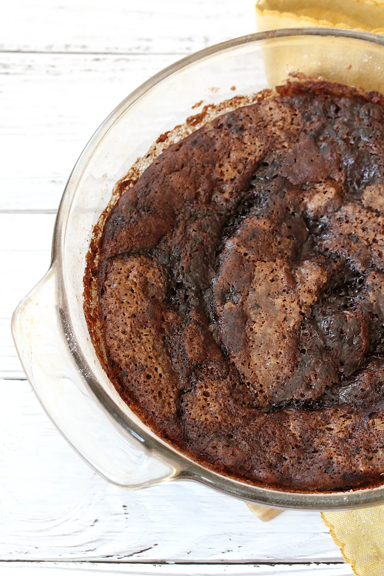 overhead image of gluten-free chocolate pudding cake in a dish